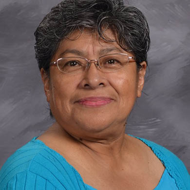 Febe Gomez smiling at the camera.