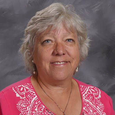 Ruth Busscher smiling at the camera.