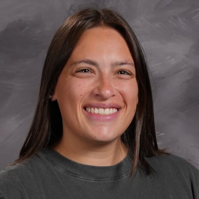 Taylor Cobos smiling at the camera