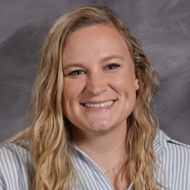 Allison DeLange smiling at the camera.