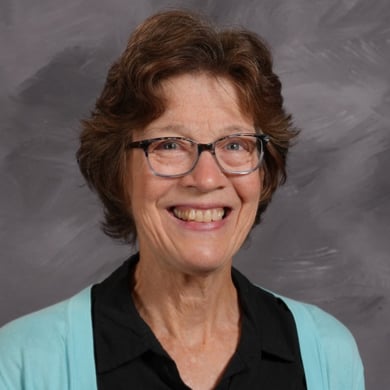 Mary Hofman smiling at the camera.