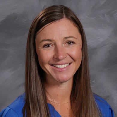 Kelli Kruithof smiling at the camera