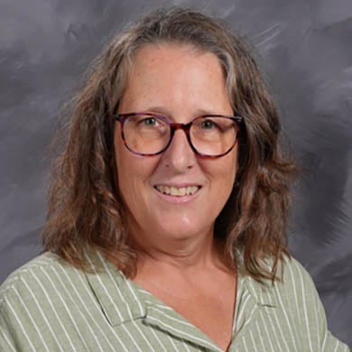 Amy Peterson smiling at the camera