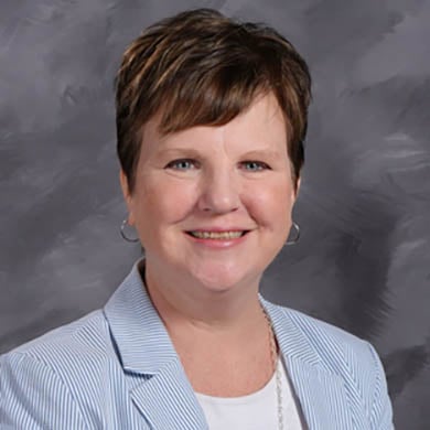 Mary Rozendal smiling at the camera