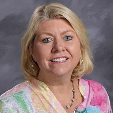 Suzanne Rutherford smiling at the camera