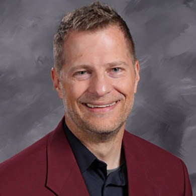 Greg Schemper smiling at the camera
