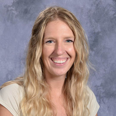 Kristin Travers smiling at camera