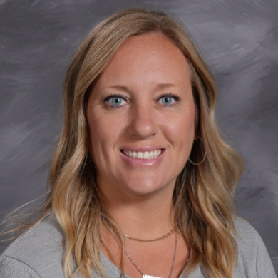 Katie VanDenBeldt smiling at camera