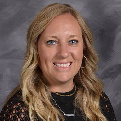 Katie VanDenBeldt smiling at camera
