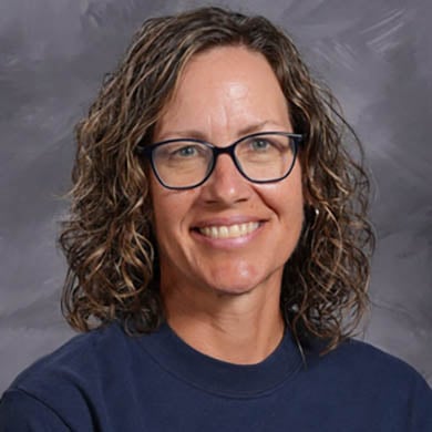 Jane VanderBeek smiling at camera