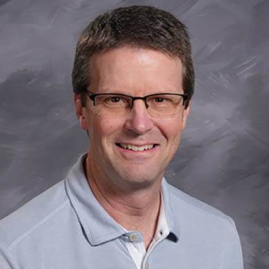 Dan Vos smiling at camera