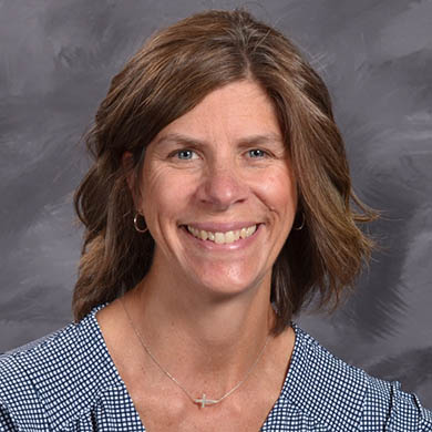 Sue Vos smiling at the camera