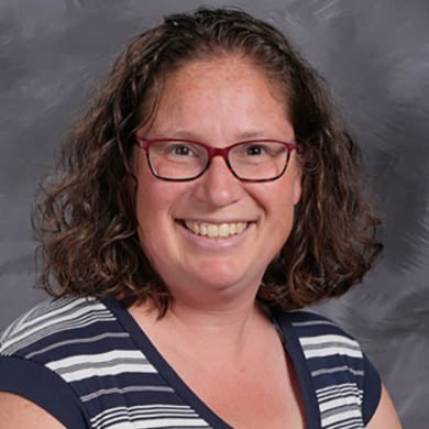 Kim Hekman smiling at the camera.