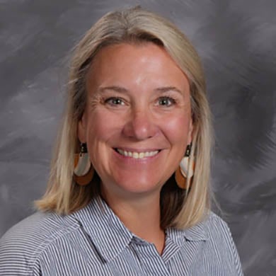 Kristin VanDyke smiling at the camera.
