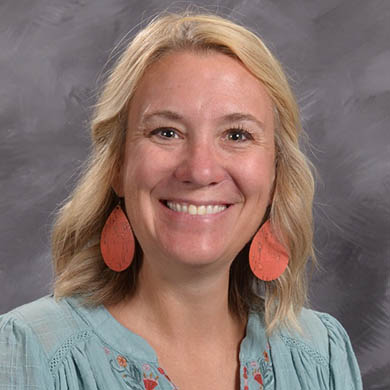 Kristin VanDyke smiling at the camera.