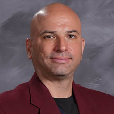 Joe Szabo smiling at the camera