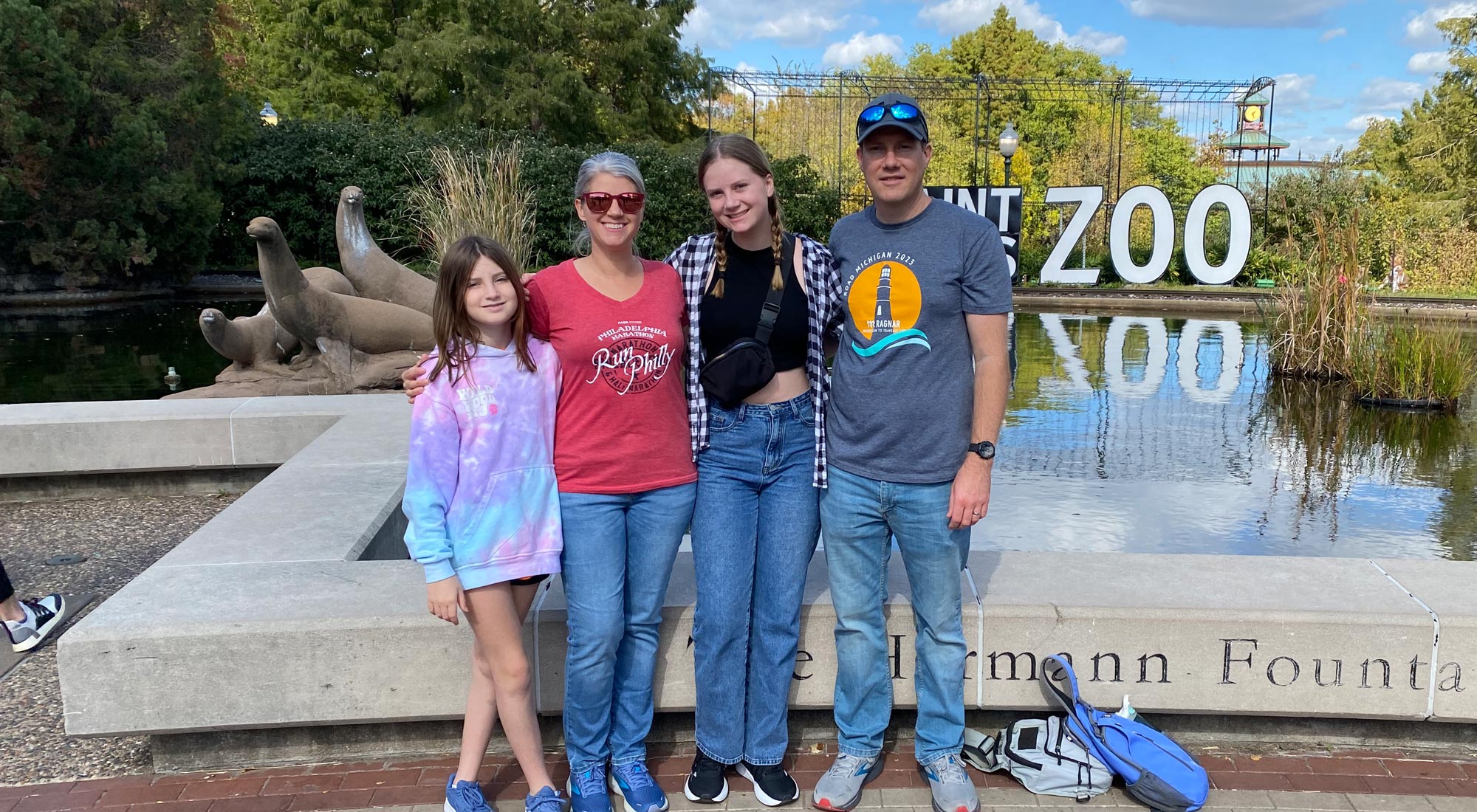The VanHorn family posing for a family photo at the zoo.