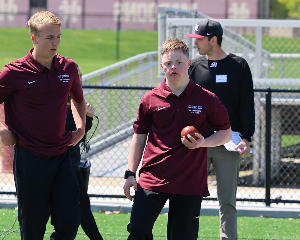 Two Unified bocce players getting ready to release the ball