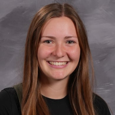Taylor Kronemeyer smiling at the camera