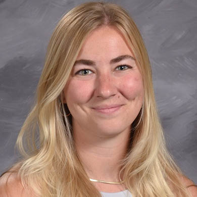 Molly Poel smiling at the camera