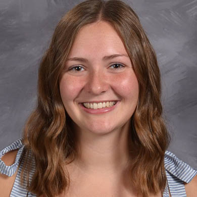 Taylor Kronemeyer smiling at the camera