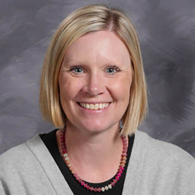 Kristin Coffman smiling at the camera