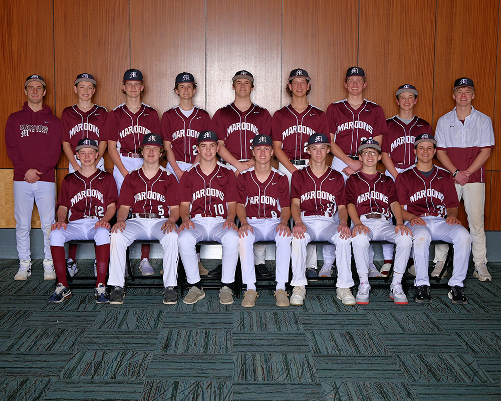 JV baseball team looking at the camera, indoors