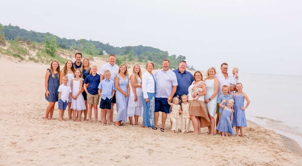Draisma family posing on the beach