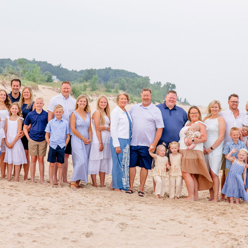 Draisma family posing on the beach