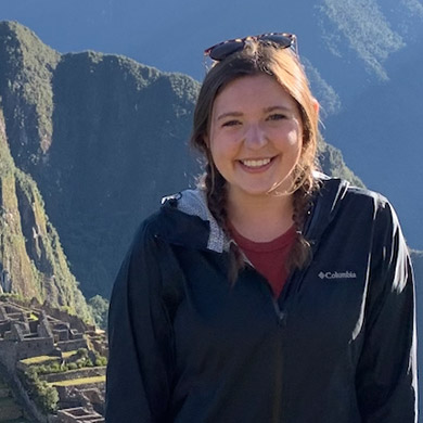 Kaylyn Bulthuis smiling with Machu Pichu in the background