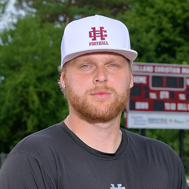 Coach Bakker looking at the camera but definitely not smiling