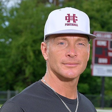 Coach Abberger looking at the camera.