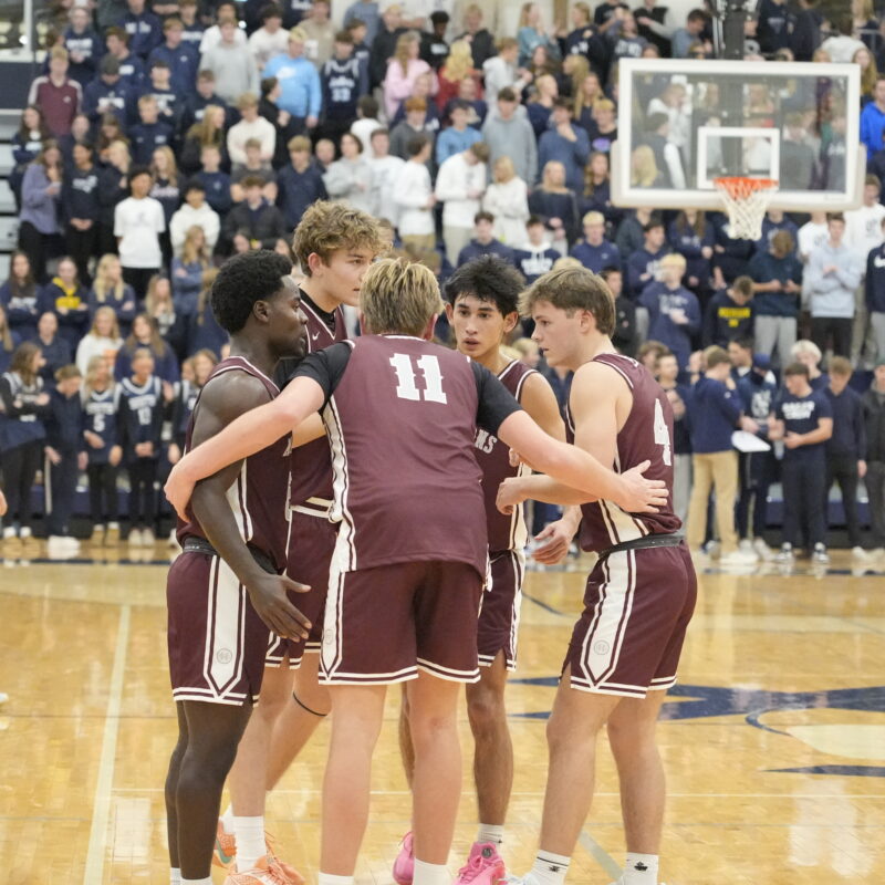 Boy's Varsity Basketball huddle