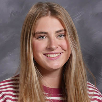 Avery Miller smiling at the camera