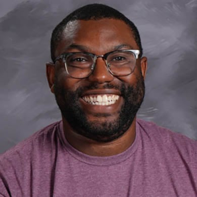 Xzavier Wolgamuth smiling at the camera